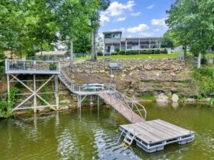 smith lake pet luxury cabins lakefront home with dog on dock - smith lake pet luxury cabins