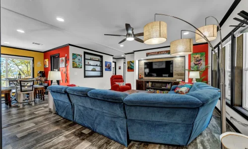 Spacious Modern Living Room With Blue Sectional Sofa